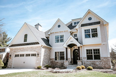 Large transitional two-story house exterior photo in Chicago