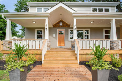 Large arts and crafts multicolored two-story mixed siding exterior home photo in Wilmington with a shingle roof