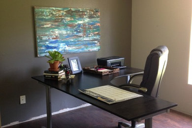 Example of a transitional home office design in San Diego