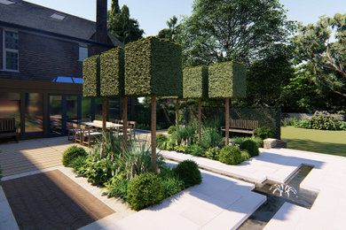 Foto de jardín de estilo americano de tamaño medio en patio trasero con exposición parcial al sol y adoquines de piedra natural