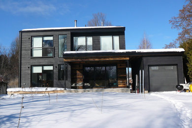 Small trendy gray two-story wood exterior home photo in Toronto