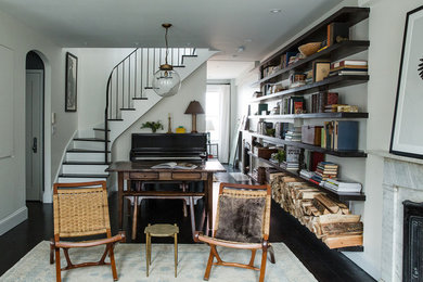 Inspiration for a small transitional open concept dark wood floor living room remodel in New York with white walls, a standard fireplace, a music area, a stone fireplace and no tv