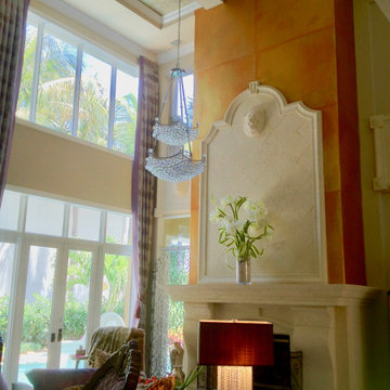 A 22' irradiated gold fireplace anchors the public face of this dockside home.