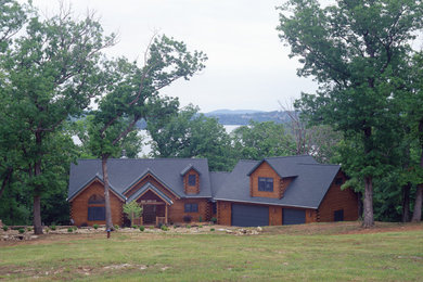 Brown two-story exterior home photo in Other