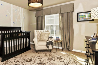 Inspiration for a small timeless boy carpeted nursery remodel in DC Metro with gray walls