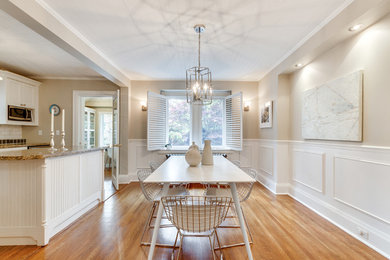 Photo of a transitional dining room in Toronto.