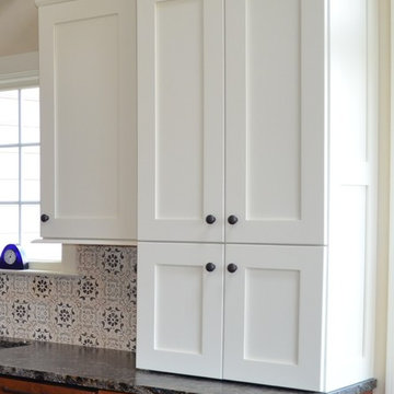 Dual-access appliance garage keeps the coffee maker hidden yet easily accessible