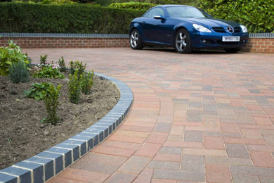 Driveway garden in Buckinghamshire with natural stone paving.