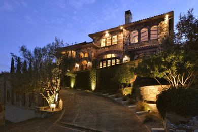 Design ideas for a huge mediterranean shade landscaping in Austin for summer.