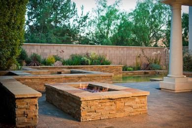 Inspiration for a mid-sized timeless patio remodel in San Diego