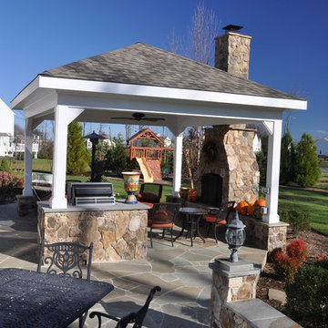 patio,pavilion,outdoor fireplace,indoor fireplace,grill,walkway,walls.