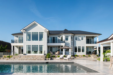 Example of a beach style home design design in Richmond