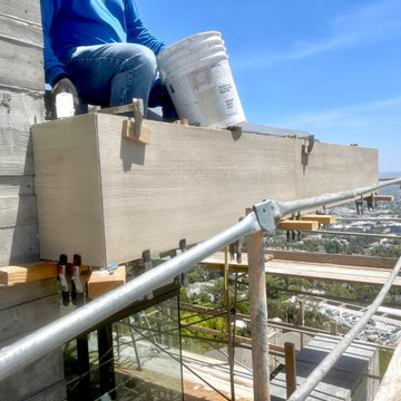 Contemporary Home with Board Formed Concrete and a Precast Cedar Fascia