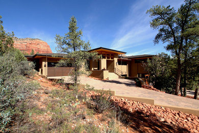 Inspiration for a rustic home design remodel in Phoenix