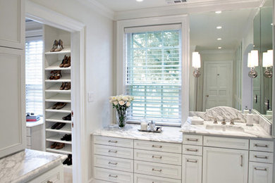 Example of a large classic master marble floor bathroom design in Raleigh with an undermount sink, beaded inset cabinets, white cabinets, marble countertops, a two-piece toilet and white walls