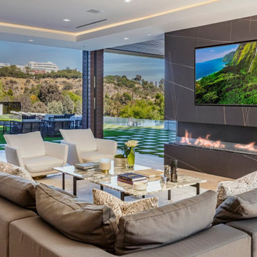 Bundy Drive Brentwood, Los Angeles modern indoor outdoor resort style living roo