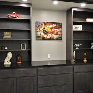 Inspiration for a mid-sized transitional study room in Indianapolis with grey walls, painted wood floors and black floor.