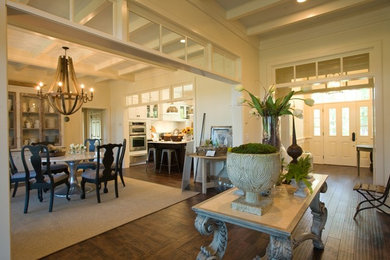Large elegant dark wood floor kitchen/dining room combo photo in Charleston with white walls and no fireplace