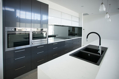 This is an example of a contemporary kitchen in Canberra - Queanbeyan.