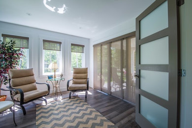 Mid-sized beach style medium tone wood floor sunroom photo in Other with a standard ceiling