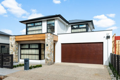 Diseño de fachada de casa pareada gris contemporánea de dos plantas con tejado de metal