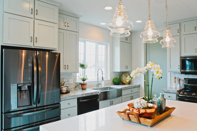 Eat-in kitchen - mid-sized craftsman l-shaped laminate floor and gray floor eat-in kitchen idea in Salt Lake City with a farmhouse sink, shaker cabinets, blue cabinets, quartz countertops, white backsplash, marble backsplash, stainless steel appliances, an island and white countertops