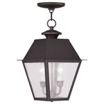 Livex Lighting - Mansfield Outdoor Chain-Hang Light, Bronze - With stunning seeded glass and a bronze finish, this outdoor hanging lantern will make an elegant addition to any outdoor space. Formed from solid brass & traditionally-inspired, this downward hanging outdoor hanging lantern is perfect for a driveway, back porch or entry way.