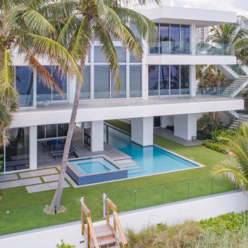 Custom Swimming Pool & Spa That Goes Underneath Part of the The House