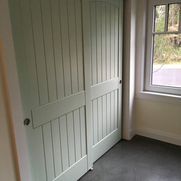 Solid wood doors with subtle bead and arch, no VOC paints