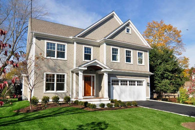 Small transitional stone front porch idea in New York