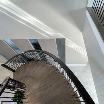 Project #114 | Freestanding Curved Foyer Staircase