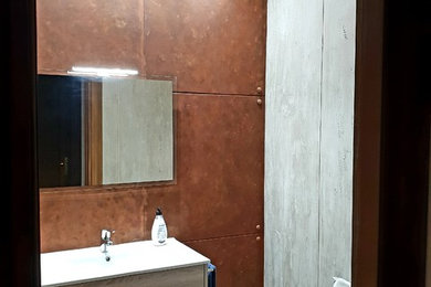 Ejemplo de cuarto de baño minimalista con paredes marrones