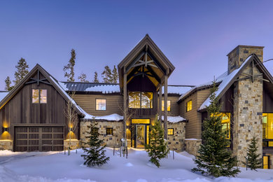 Large contemporary brown exterior home idea in Denver with a metal roof and a brown roof