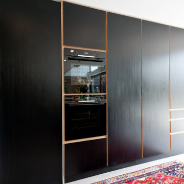 Black and wood vibrant contemporary kitchen