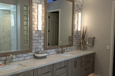Design ideas for a medium sized farmhouse ensuite bathroom in Phoenix with recessed-panel cabinets, medium wood cabinets, a freestanding bath, a one-piece toilet, multi-coloured tiles, porcelain tiles, porcelain flooring, a submerged sink, quartz worktops, an open shower, multi-coloured worktops, double sinks and a floating vanity unit.