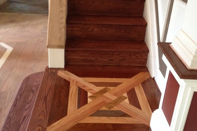 Inspiration for a mid-sized eclectic wood straight staircase in Baltimore with wood risers.