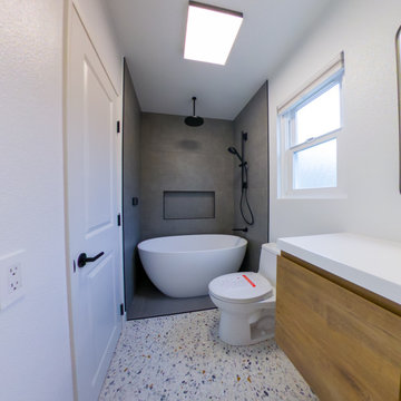 Ultra-Modern Smart Bathroom with Terrazzo Floor & Oval Soaking Tub