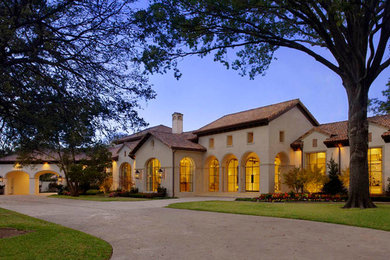 Inspiration for a mediterranean exterior home remodel in Dallas