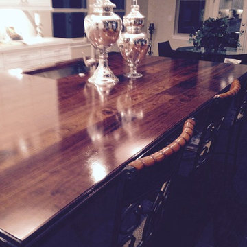 High-gloss Walnut Island Top by DeVos Customer Woodworking