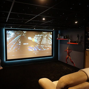 Home theater - modern home theater idea in Clermont-Ferrand