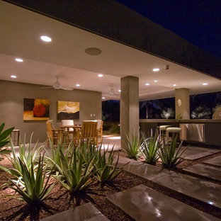 Idée de décoration pour un xéropaysage arrière vintage l'automne avec des pavés en béton.