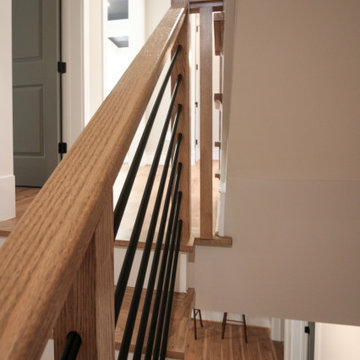 Project #83 | U-Shaped Staircase with Horizontal Black Rod Railing
