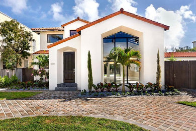 Transitional exterior home idea in Miami