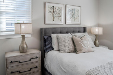 This is an example of a transitional bedroom in Huntington.