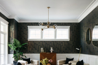 Inspiration for a transitional dark wood floor, brown floor, wainscoting and wallpaper living room remodel in Chicago with gray walls