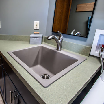 Updated Laundry Room with Stormy Medium-Blue Cabinets