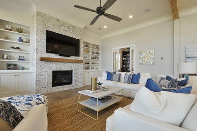 Beach style family room photo in Other