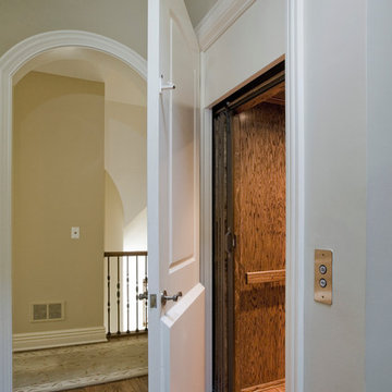 Residential Red Oak Paneled Three Stop Elevator