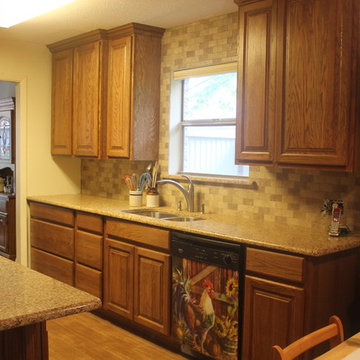 Tawny Oak Cabinets w/Chocolate Truffle Caesarstone and Subway Backsplash