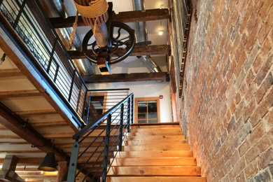 Inspiration for an industrial staircase remodel in Boston